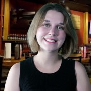 Smiling young woman with chin-length hair